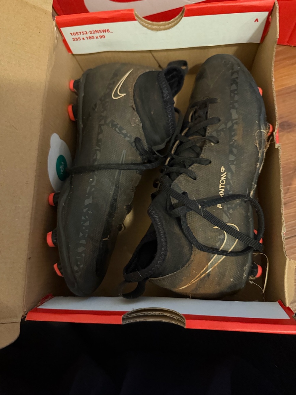 Nike Men’s Black Soccer Cleats with Red Stud Accents